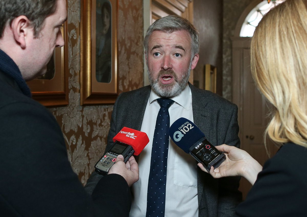 Liam Herrick speaking to journalists
